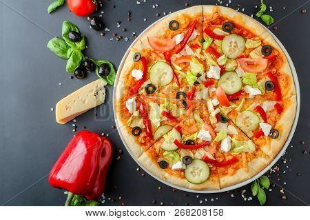 Vegetarian Italian Pizza With Vegetables And Ingredients On Wooden Background, Top View. Healthy Tat