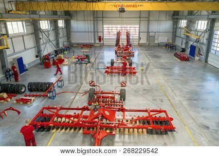 Roshchinsky, Russia - June 21, 2018: Plant For The Production Of Agricultural Machinery. Workers Mak
