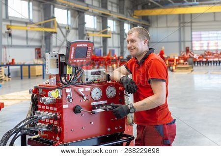 Roshchinsky, Russia - June 21, 2018: Plant For The Production Of Agricultural Machinery. Workers Mak