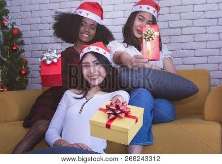 Christmas And Happiness Concept - Smiling Sandy Girl Holding Many Gift Boxes.