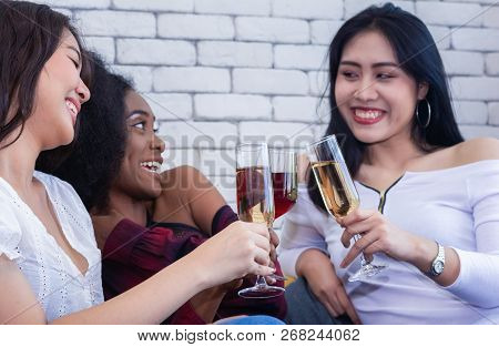 Closeup Photo Of Cheerful Girls Celebrating A Party At Home With Campaign.