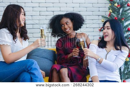 Closeup Photo Of Cheerful Girls Celebrating A Party At Home With Campaign.