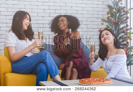 Closeup Photo Of Cheerful Girls Celebrating A Party At Home With Campaign And Pizza.
