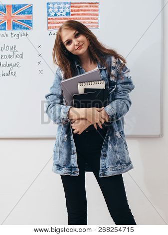 Female Student Looking At Camera. English Language School.