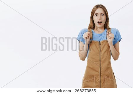 Portrait Of Stunned Afriad Girl Gasping From Shocked And Worried Feeling Remaining Speechless Pressi
