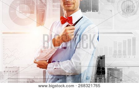Confident And Young Businessman In Smart-casual Wear Smoking Pipe And Modern Cityscape With Business
