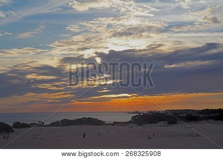 Sunset Over Albemarle Sound As Viewed By Unidentifiable People From Jockeys Ridge State Park In The 