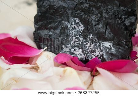 Stone In Rose Petals Background For Design Romance