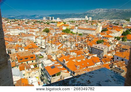 Old City Buildings With Orange Roofs And Mosor Mountain Aerial Panoramic View From Venetian Saint Do