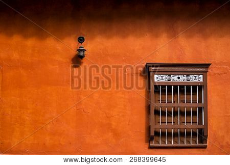 Window In Orange Rural House Facade -window And Lantern -  Minimalist Concept
