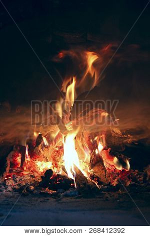 Fire Wood Brighly Burning In Furnace. Fire And Flames