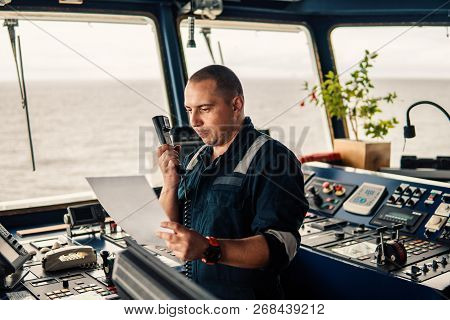 Marine Navigational Officer Is Reporting By Vhf Radio