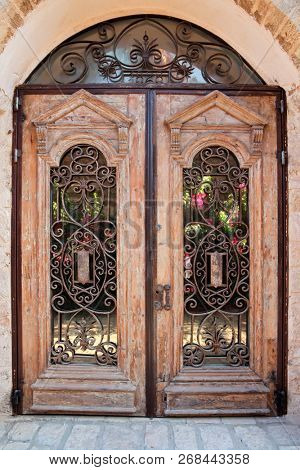 Decorated, antique wooden door in the ancient city of Jaffa, Israel