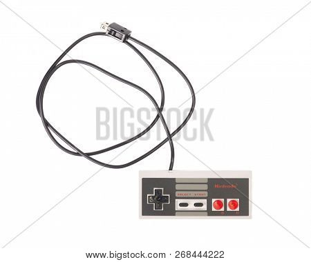 BUDAPEST, HUNGARY - DECEMBER 10, 2017: Nintendo NES classic controller hanging from above. One of the most classic gaming consoles