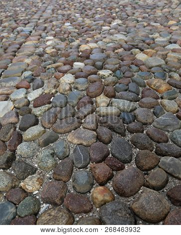 Cobblestone Street In The Historic Center Of An Italian City