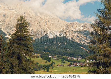 Panoramic View Of The Dolomite Mountains. Mountain Village Cortina Di Ampezzo.
