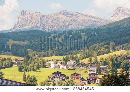 Panoramic View Of The Dolomite Mountains. Mountain Village Cortina Di Ampezzo.