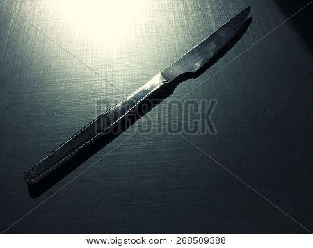 Full Metal Table Knife On A Dark Background, Table Knife, Cutlery, Dark Background, Metallic Materia