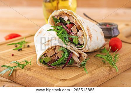 Tortillas Wraps With Chicken And Vegetables On  Wooden Background. Chicken Burrito. Healthy Food.