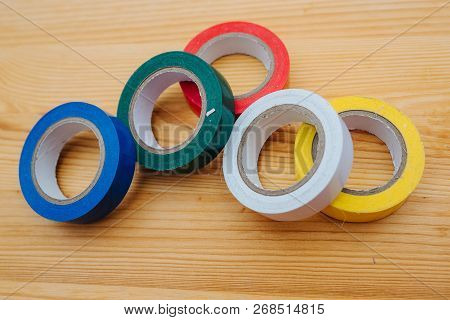 Color Rolls Of Gaffer Tape, Duct Tape, On A Wood Background
