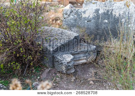 The Remains Of The Column On The Ruins Of The Destroyed Roman Temple, Located In The Fortified City 
