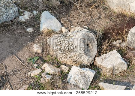 The Remains Of The Column On The Ruins Of The Destroyed Roman Temple, Located In The Fortified City 