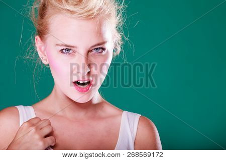 Face Expression, Emotions Concept. Young Woman With Pin Up Hair Being Angry, Shocked And Disgust. St