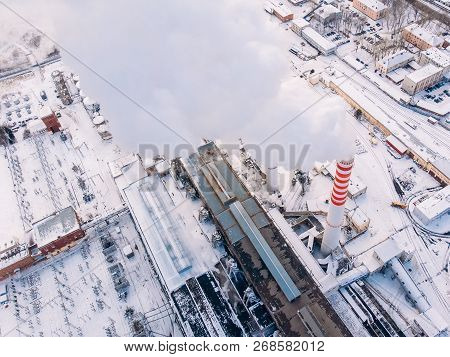 Aerial Top View Clouds Of Smoke And Steam Cooling Tower Industrial Heat Electro Central Coal. Enviro