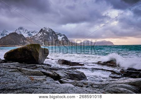 Rocky coast of fjord of Norwegian sea in winter. Vareid, Lofoten islands, Norway