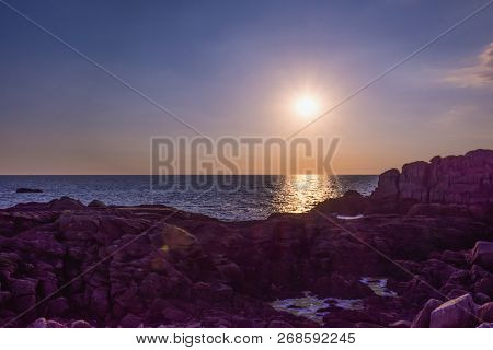 Sunset At The Granite Rocks Of Saint-guenole Brittany, France