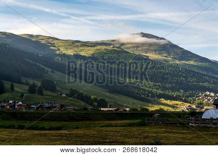 Beautiful Summer Landscape With Monte Della Neve Mountain Peak Over Livigno, Italy, Sunrise On Summe