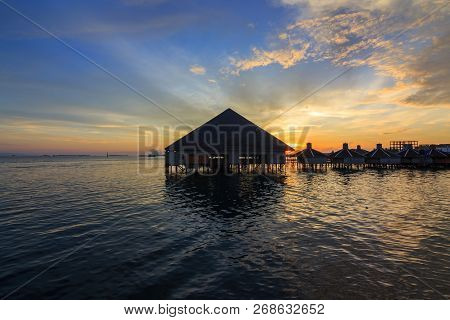Beautiful Twilight Sunrise With Silhouette Floating Resort In Semporna, Sabah, Borneo (image Contain