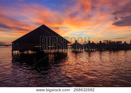 Beautiful Twilight Sunrise With Silhouette Floating Resort In Semporna, Sabah, Borneo (image Contain