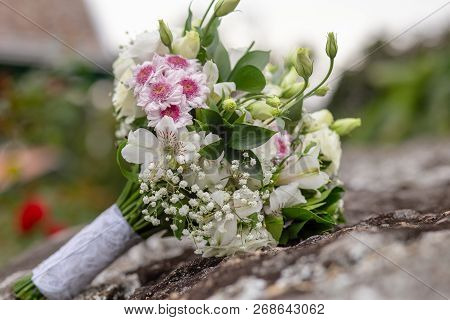 Bridal Bouquet In Rustic Place, For Use In Wedding Websites Or Blogs.