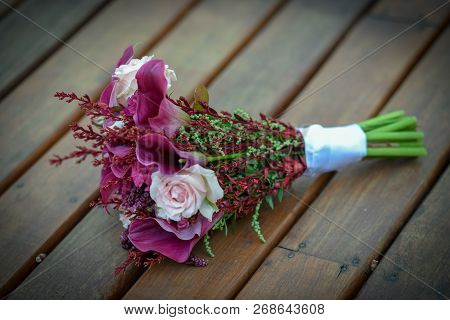 Bridal Bouquet In Rustic Place, For Use In Wedding Websites Or Blogs.