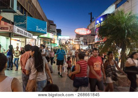 Corrientes, Argentina: Feb 11, 2015: People Walk On A Street In Corrientes Argentina