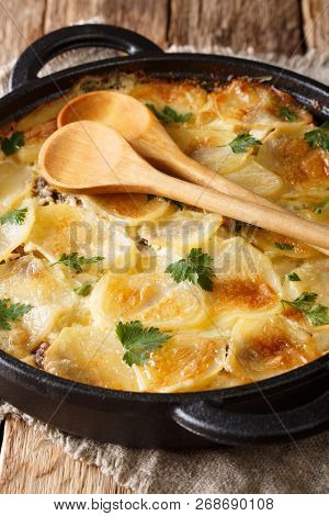 Janssonin Kiusaus Four Ingredient Finnish Potato Bake Closeup On The Table. Vertical