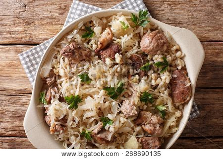 Traditional Estonian Festive Dish Of Pork, Barley And Sauerkraut Closeup On The Table. Horizontal To