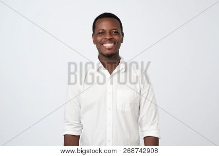 Handsome Man Showing Tongue And Winking At The Camera Having Funny Look