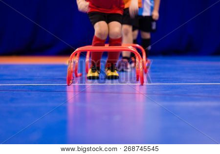 Futsal Jumping Drills. Futsal Indoor Soccer Training Session. Young Futsal Players Exercising For Ag