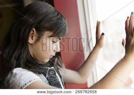 Nice Little Girl By The Window Feel Sad