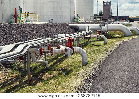 Steel Fuel Pipes And Valves At The Oil Refinery