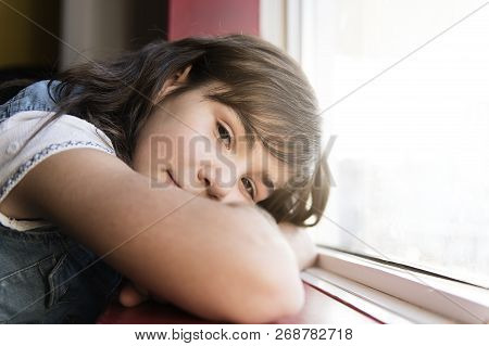 Nice Little Girl By The Window Feel Sad