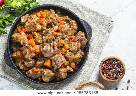Beef Stew With Vegetables On Light Background. European Cuisine. Top View.