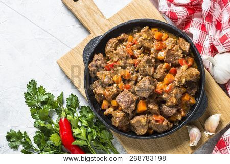 Beef Stew With Vegetables On Light Background. European Cuisine. Top View.