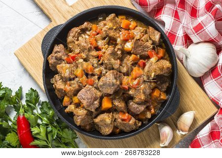 Beef Stew With Vegetables On Light Background. European Cuisine. Top View.