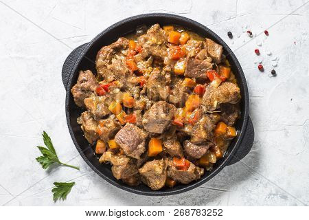 Beef Stew With Vegetables On Light Background. European Cuisine. Top View.