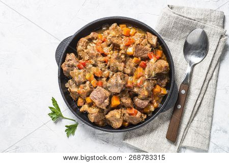 Beef Stew With Vegetables On Light Background. European Cuisine. Top View.