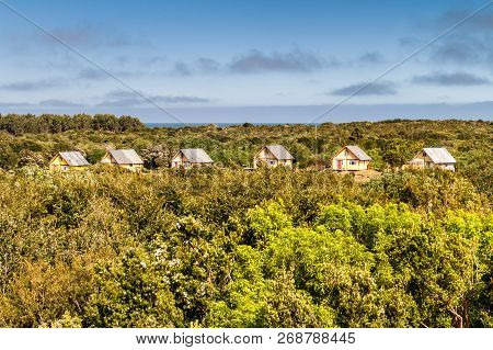 Huts Of Tourist Resort In Chiloe National Park, Chile