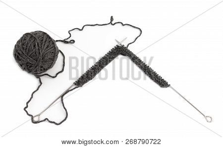 Knitting Needles With Knitting , Gray Ball Of Wool On White Background